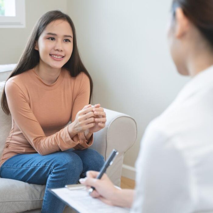 a person talks to a therapist